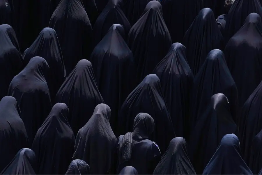 Iran state media under fire after publishing woman without hijab photo