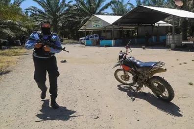 Honduras bloodbath: 25 killed as gunmen launch dual coastal attacks, ambush police task force