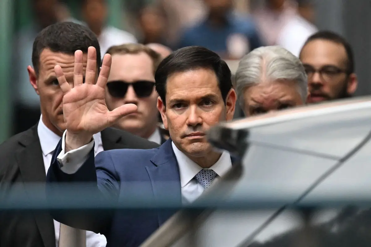 US Secretary of State Marco Rubio gestures as he walks out of the international headquarters of Missionaries of Charity, known as the "Mother House" in Kolkata, on May 23, 2023. (Photo by Dibyangshu SARKAR / AFP)