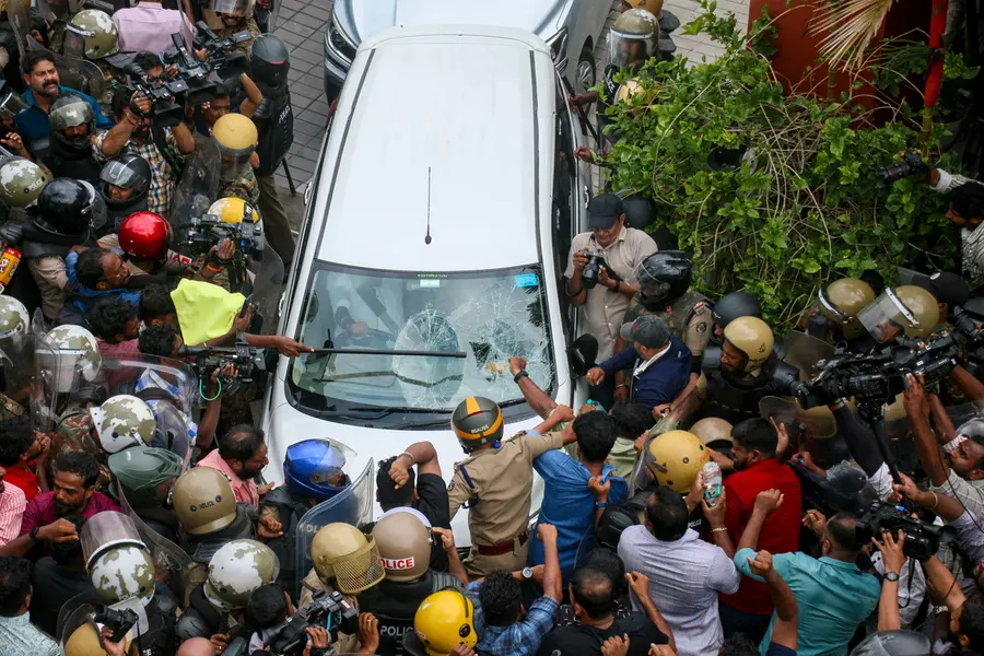Left Democratic Front (LDF) activists attack the vehicle carrying Enforcement Directorate (ED) officials outside former Kerala CM Pinarayi Vijayan’s residence | PTI