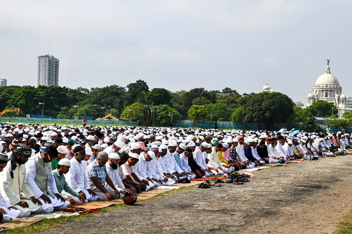 People offer prayers on the occasion of Eid al-Adha at Brigade Parade Ground, in Kolkata | Photo: PTI