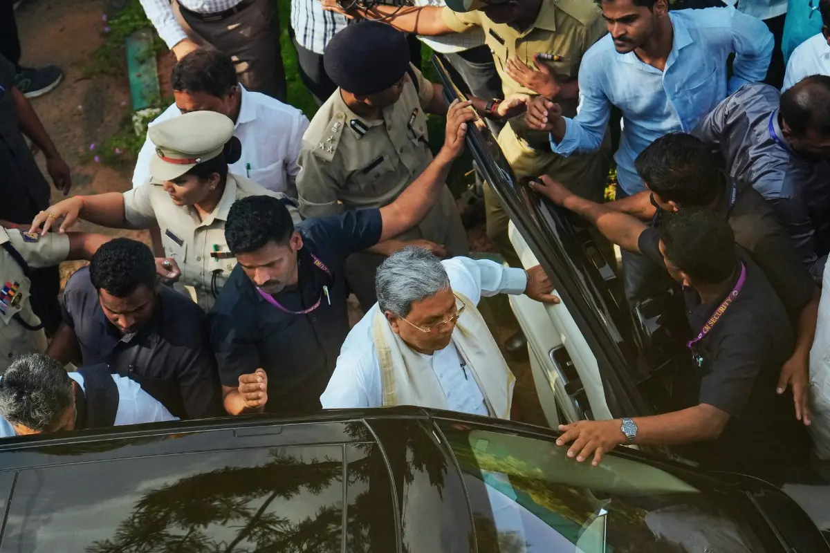 Karnataka Chief Minister Siddaramaiah leaves after addressing a press conference following the announcement of his resignation | Photo: PTI