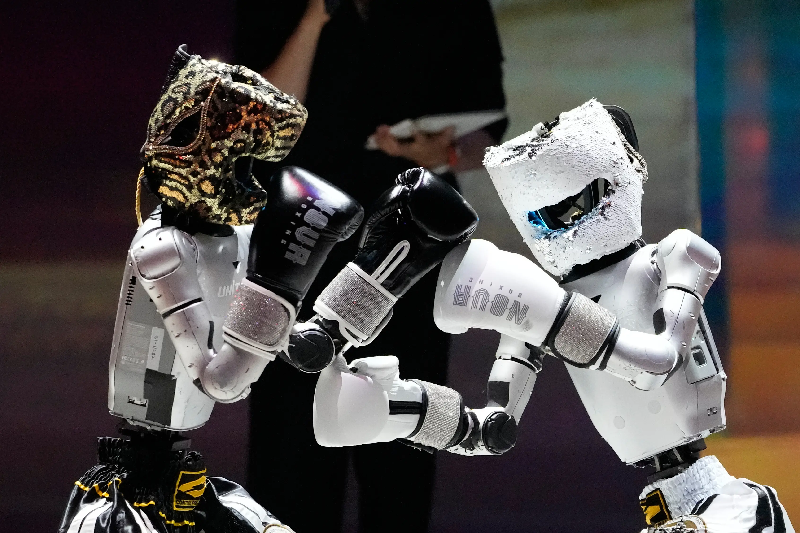 Humanoid robots compete in a boxing demonstration in Seoul, South Korea, Thursday, May 28, 2026. (AP Photo/Ahn Young-joon)