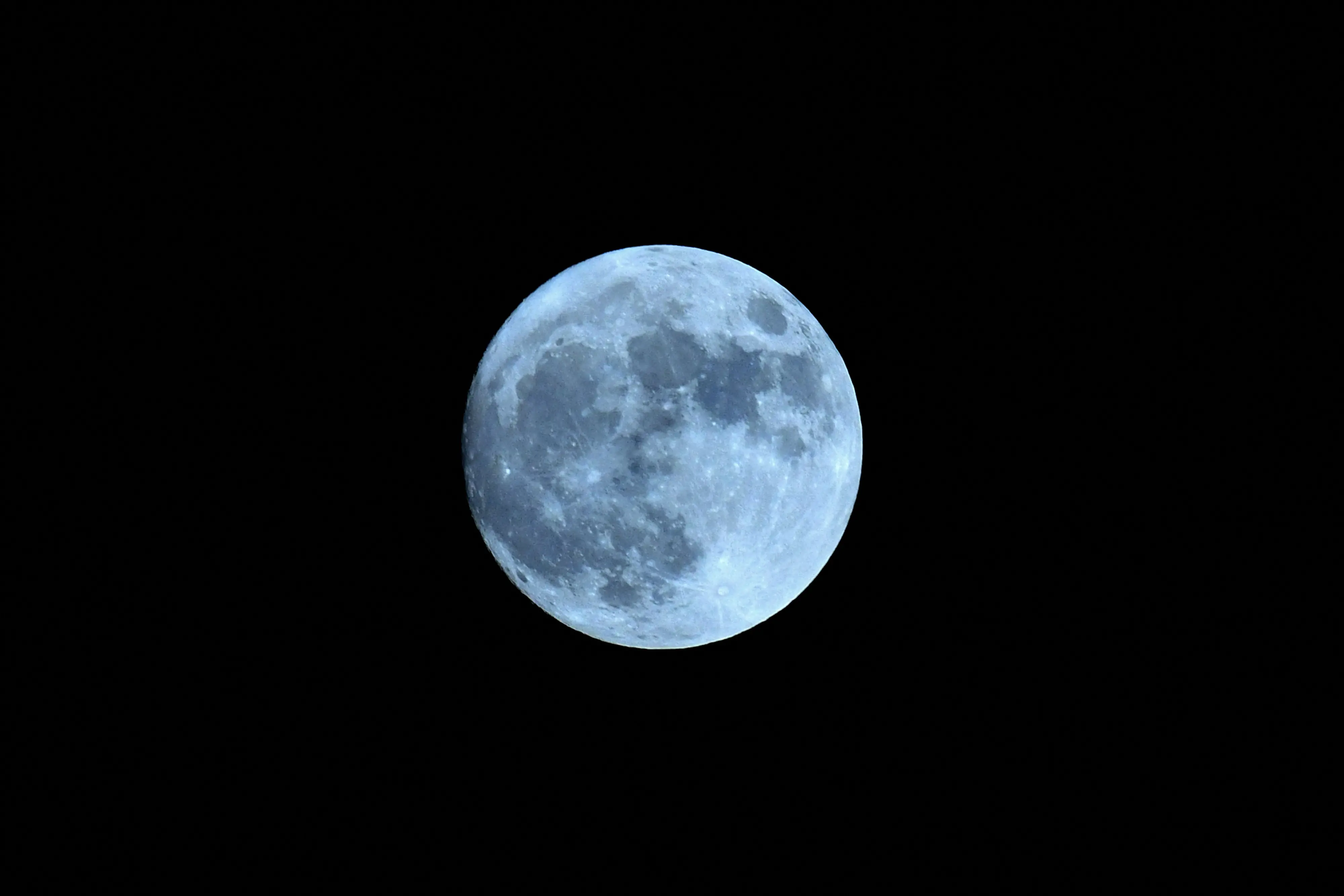 The 'Blue Moon' is pictured above the sky in Kamrup district of Assam on August 30, 2023.
