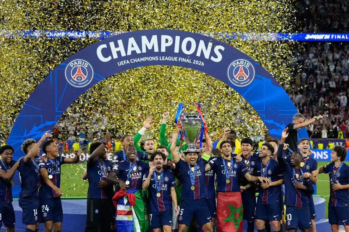 PSG's Marquinhos lifts the trophy celebrating after winning the Champions League final soccer match between Paris Saint-Germain and Arsenal in Budapest, Hungary, Saturday, May 30, 2026. (AP/PTI)