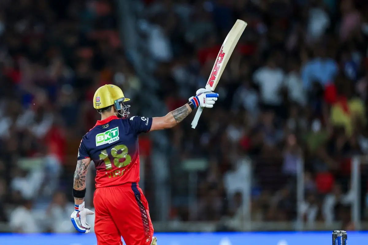 Royal Challengers Bengaluru's Virat Kohli celebrates his half-century during the Indian Premier League 2026 Final match against Gujarat Titans at Narendra Modi Stadium, in Ahmedabad on Sunday. (ANI Photo)