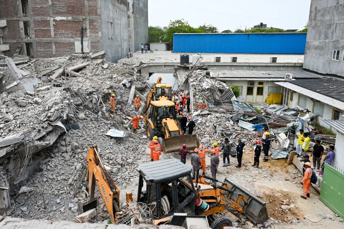 NDRF and police conduct a rescue operation after a three-storey commercial building collapsed on Saturday evening near the Saket Metro station, in New Delhi, Sunday, May 31, 2026 (Photo: PTI)