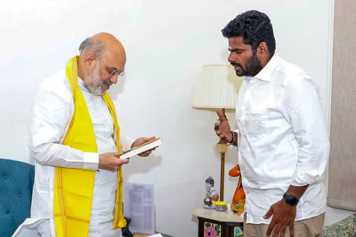 K Annamalai, right, meets Union Home Minister Amit Shah after submitting his resignation as BJP leader from Tamil Nadu, in New Delhi.| Photo: PTI
