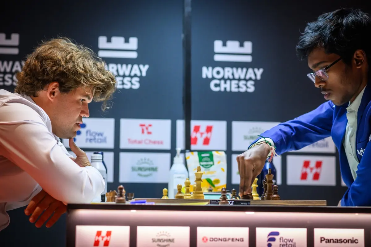 R Praggnanandhaa and Magnus Carlsen facing off during the Norway Chess | Photo: @CheckmateDaily on X