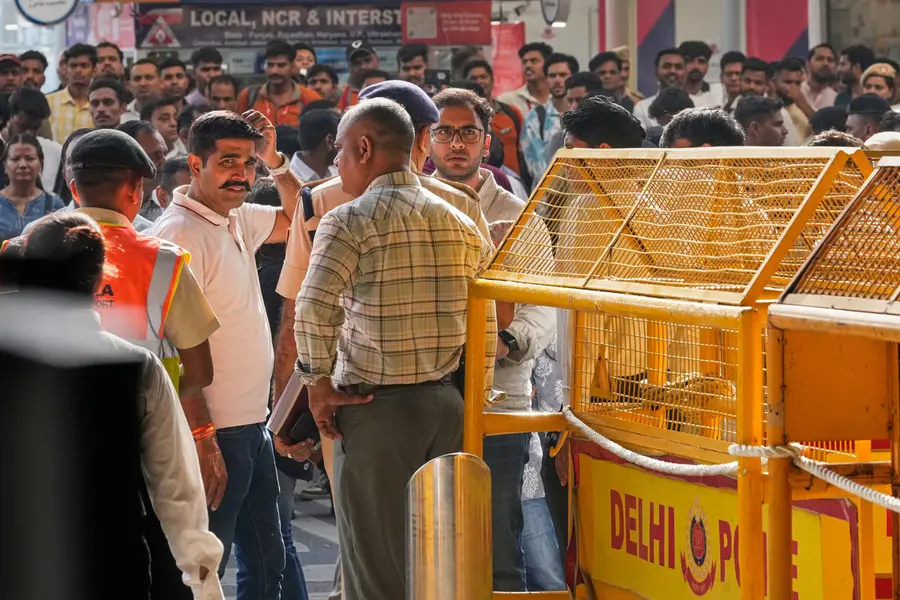 Saurabh Das, centre, spokesperson of Cockroach Janta Party waits for the arrival of Abhijeet Dipke, founder of CJP at Indira Gandhi International airport in New Delhi | AP