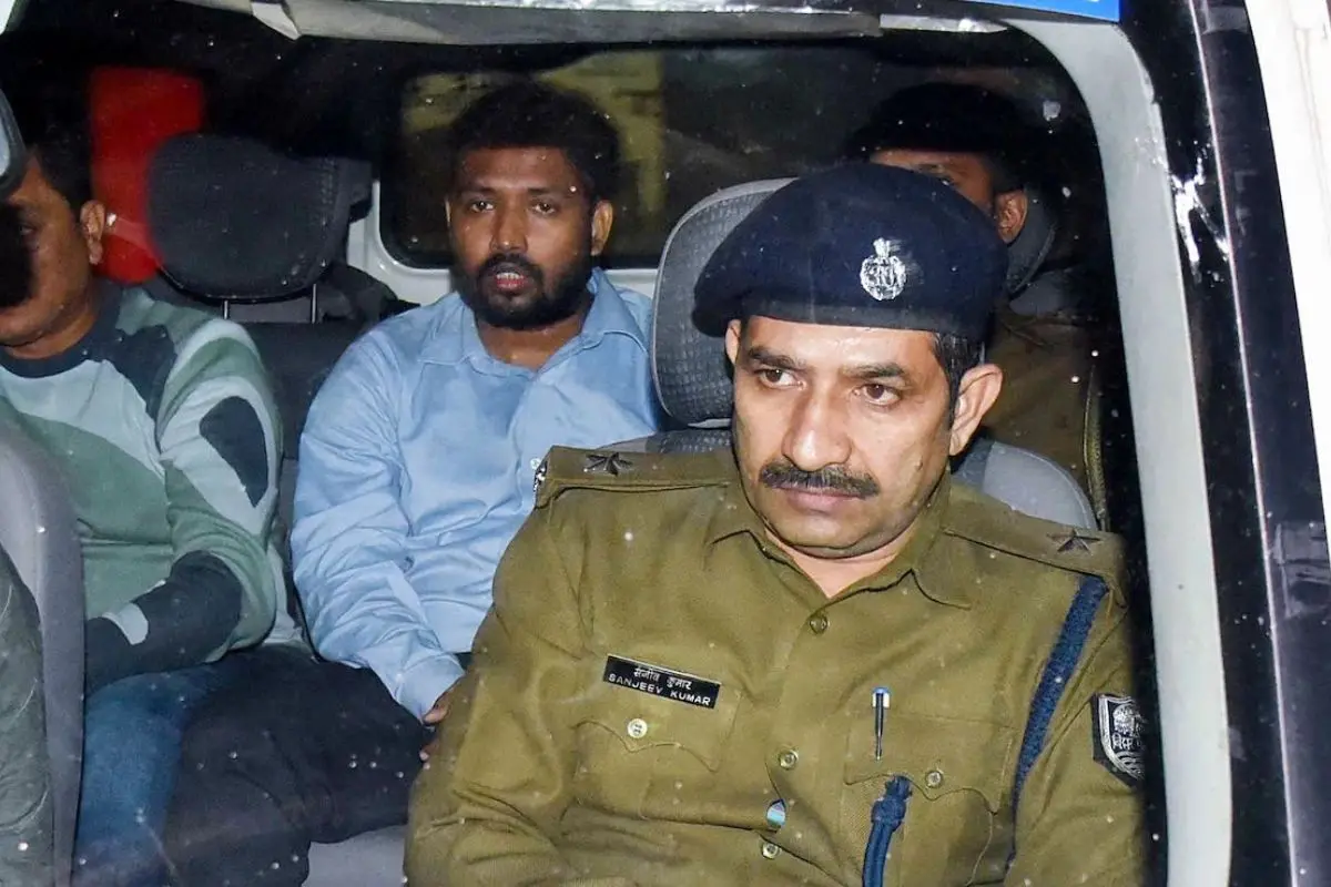 Popular educator Khan Sir seen in a police vehicle.