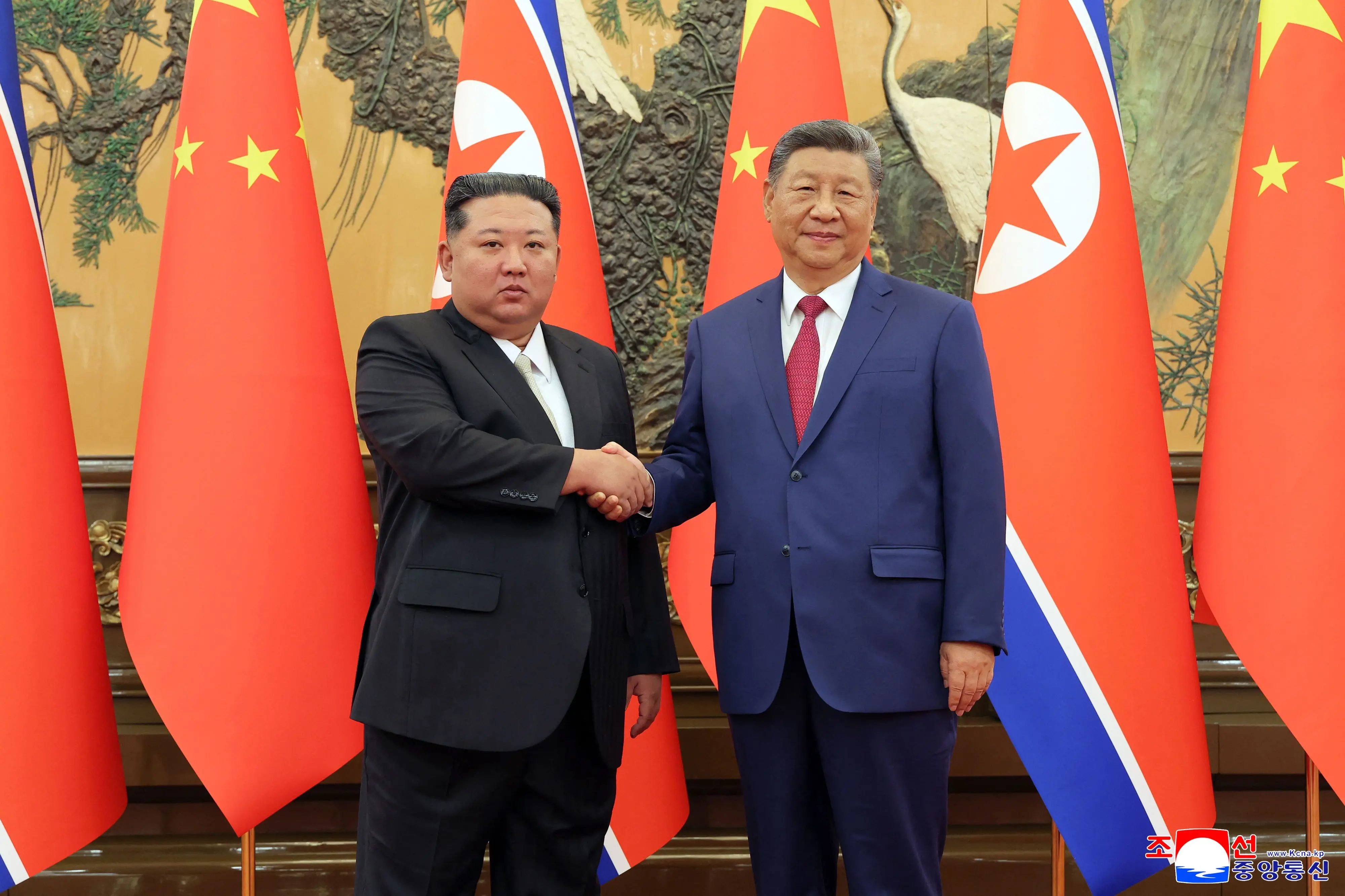 North Korean leader Kim Jong Un and Chinese President Xi Jinping | Photo:  AFP