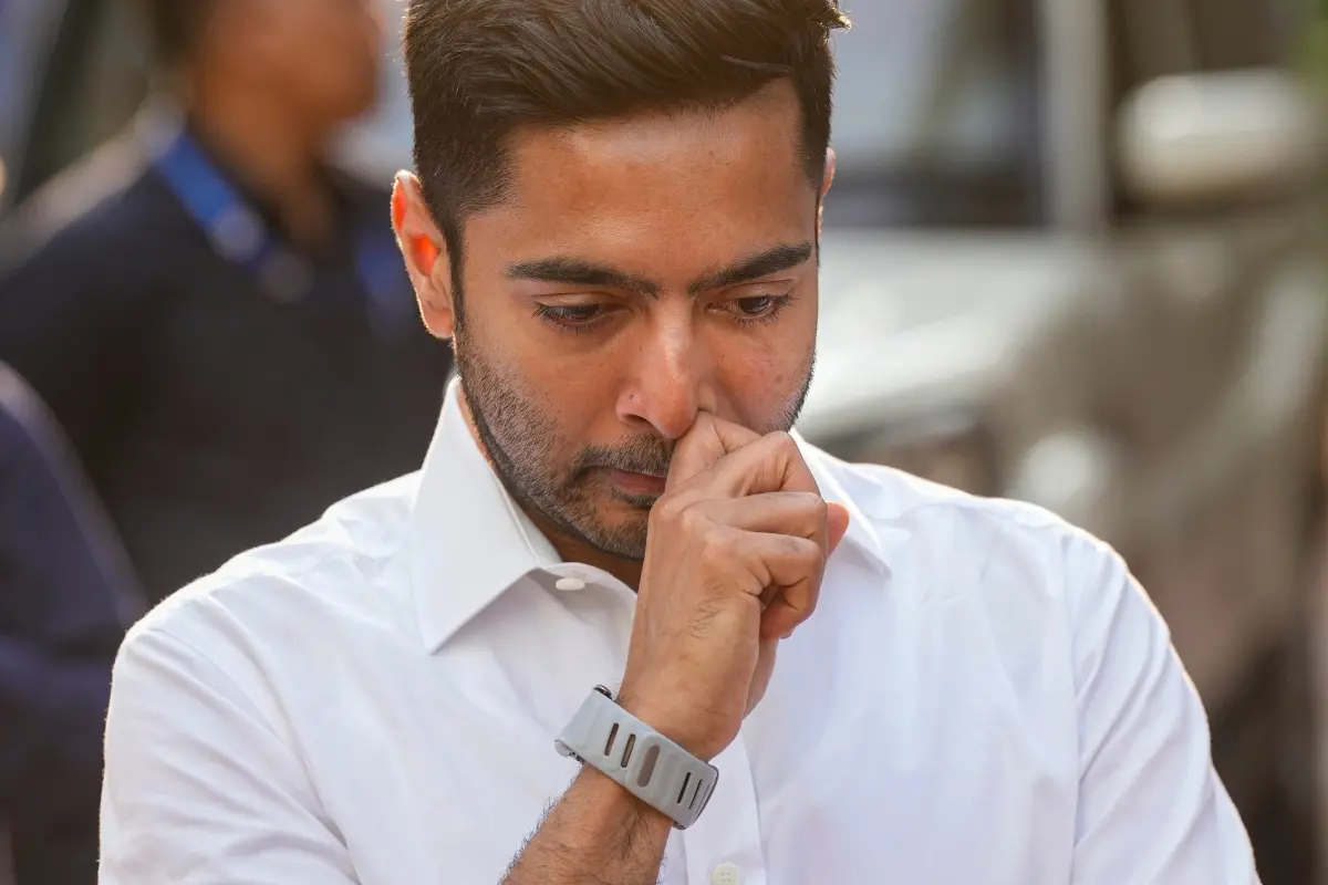 TMC national general secretary Abhishek Banerjee looks on as Samajwadi Party chief Akhilesh Yadav, unseen, speaks to the media, in Kolkata.| Photo: PTI