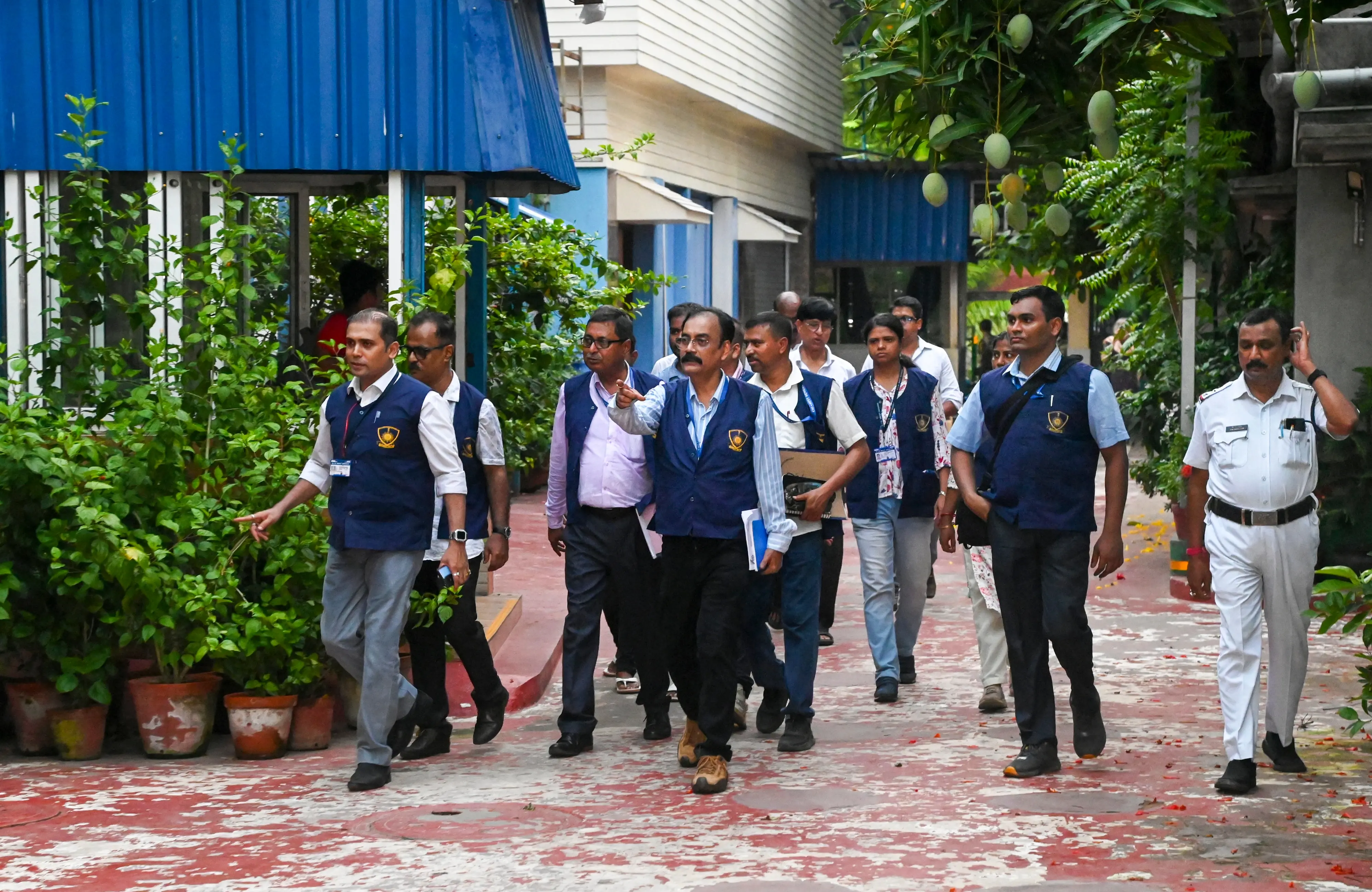 Crime Investigation Department (CID) officials arrive at TMC party office adjacent to the residence of TMC supremo Mamata Banerjee | PTI