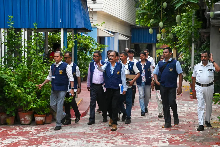 Crime Investigation Department (CID) officials arrive at TMC party office adjacent to the residence of TMC supremo Mamata Banerjee