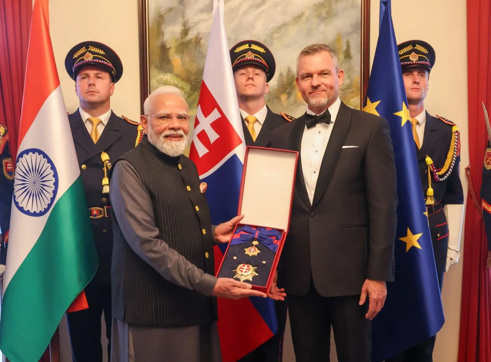 PM Modi receives Order of the White Double Cross (1st Class) from Slovakian President Peter Pellegrin | Photo: X/@narendramodi