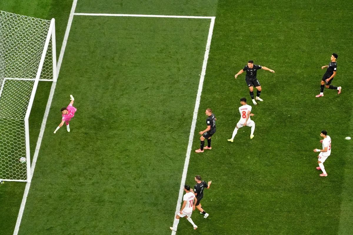 Iran's Mohammad Mohebbi (8), center, scores his side's second goal during the World Cup Group G soccer match between Iran and New Zealand in Inglewood, Calif., near Los Angeles (Photo: AP)