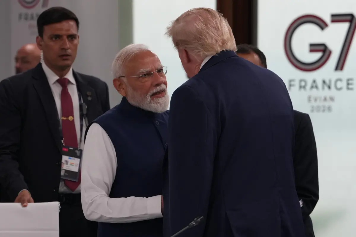 India's Prime Minister Narenda Modi shakes hands with U.S. President Donald Trump