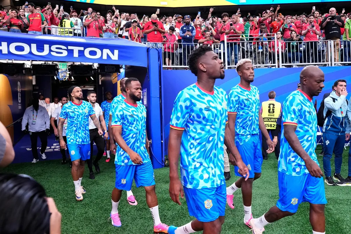 Congo players enter the pitch for warm up before the World Cup Group K football match between Portugal and Congo in Houston | Photo: AP