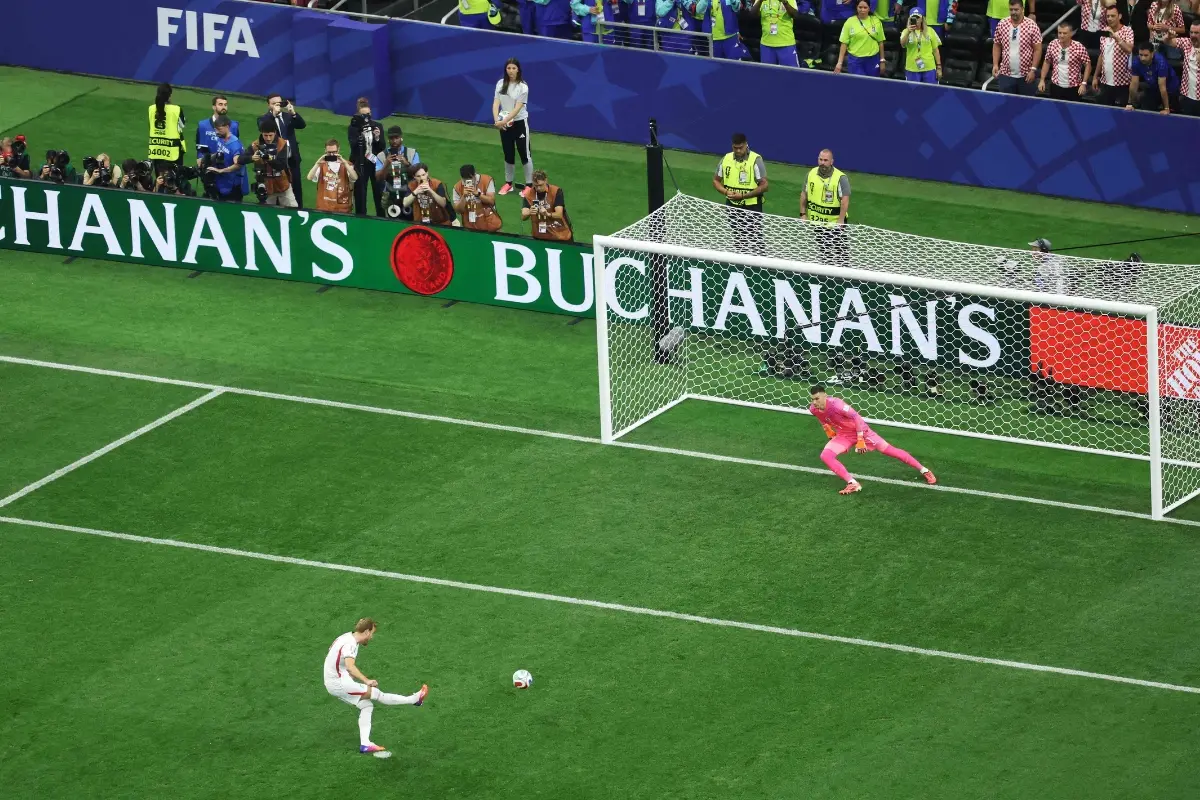 Harry Kane #9 of England scores a penalty for his team's first goal during the FIFA World Cup 2026 Group L match between England and Croatia | Photo: Getty Images via AFP
