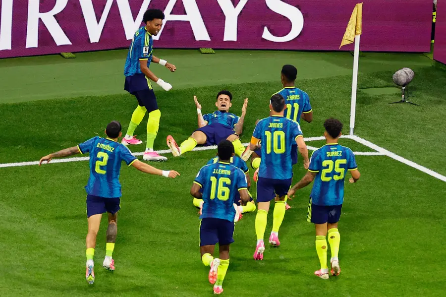 Colombia's Luis Diaz (top-C) celebrates with teammates after scoring his team's second goal