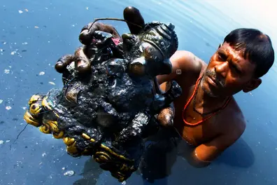 Gods, trash and toxins: Life of Delhi’s coin divers