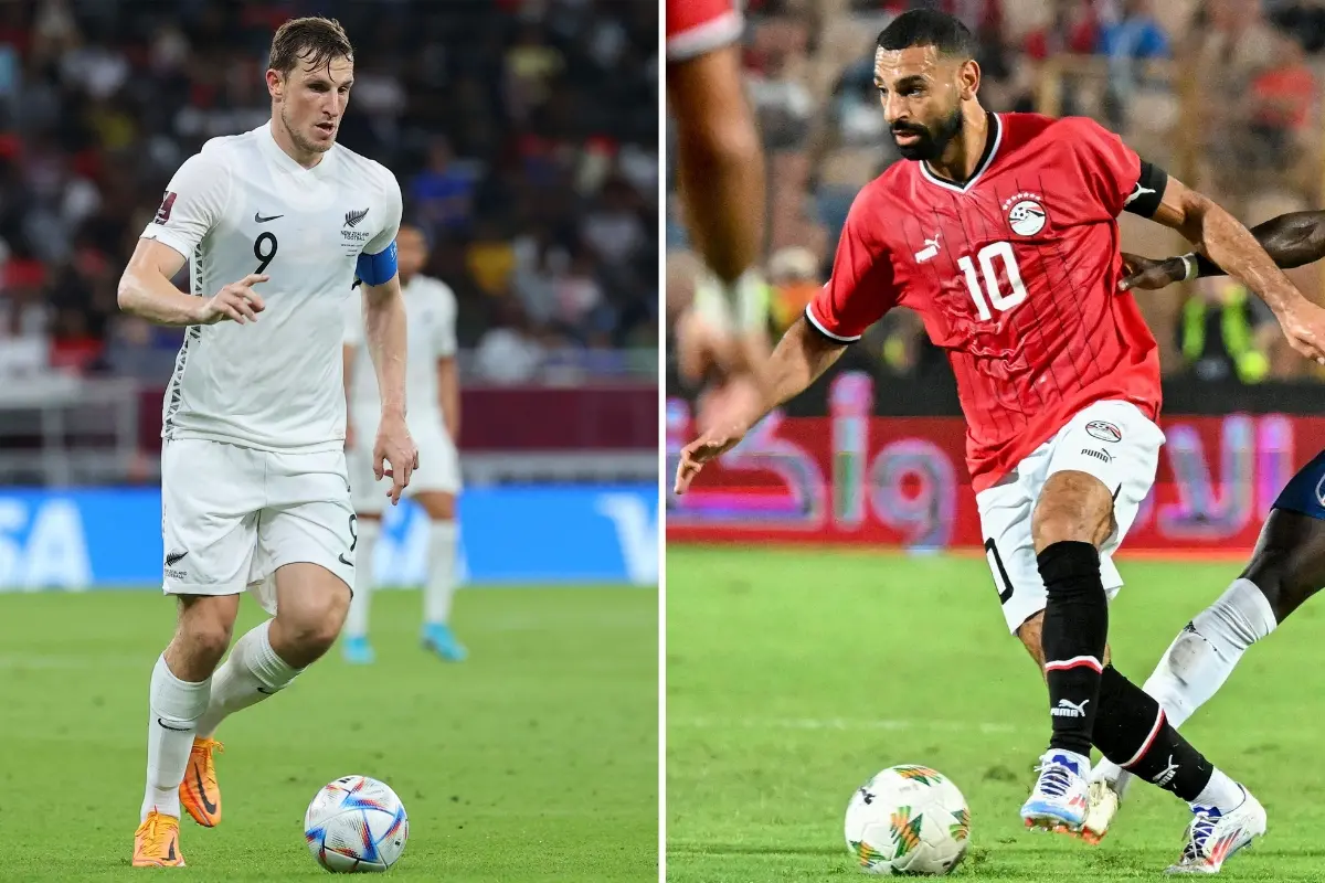 New Zealand's forward Chris Wood (L) and Egypt's forward #10 Mohamed Salah | Photo: AFP