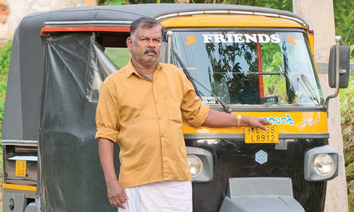 ഒാട്ടോറിക്ഷയ്ക്കൊപ്പം ടി.കെ.രാജു