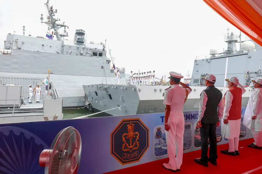 Prime Minister Narendra Modi, West Bengal Chief Minister Suvendu Adhikari, Governor RN Ravi and Chief of the Naval Staff Admiral Krishna Swaminathan during the tri-commissioning ceremony of INS Dunagiri, INS Sanshodhak and INS Agray at Syama Prasad Mookerjee Port
