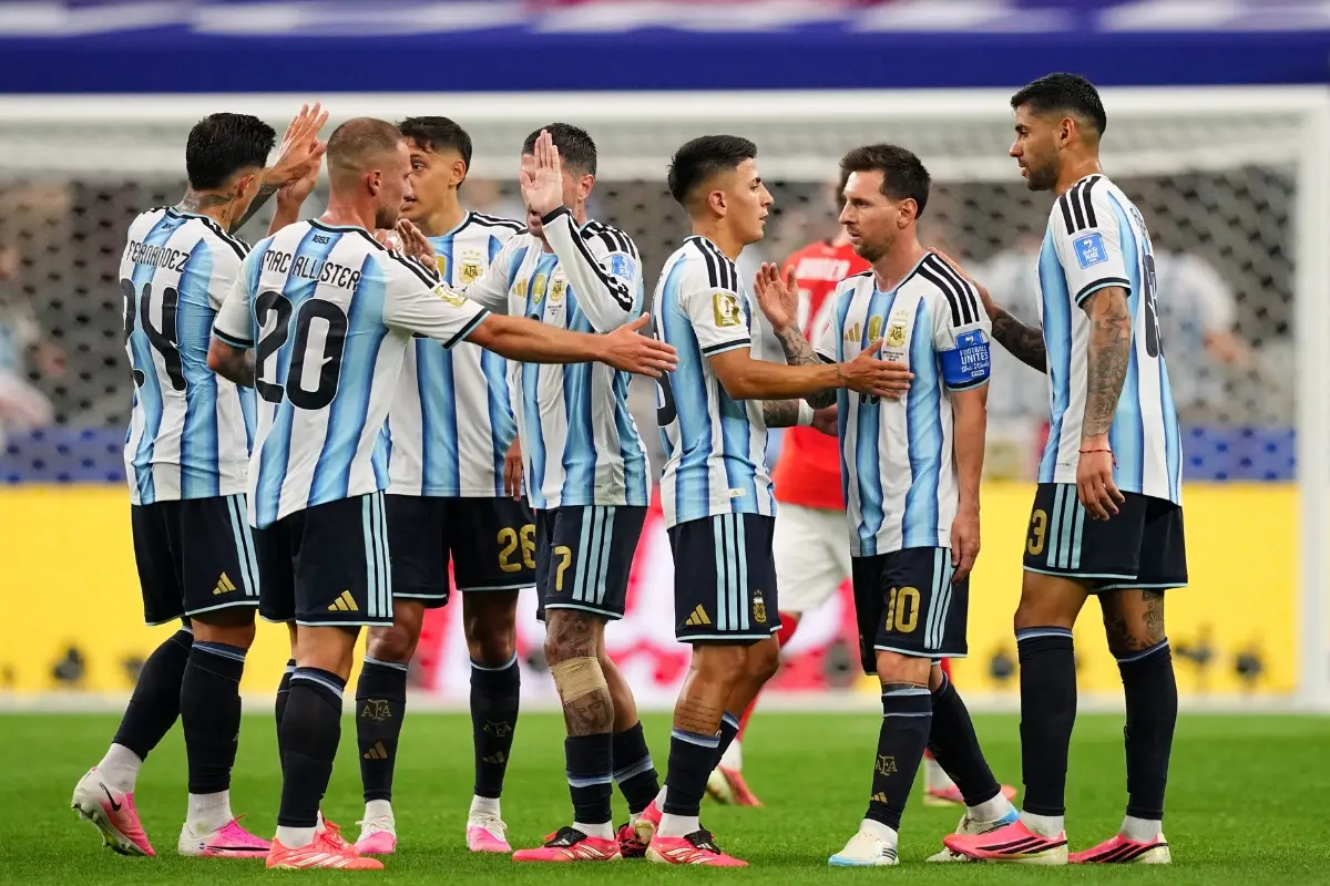 Argentina players celebrates at the end of the first half during the World Cup Group J football match between Argentina and Austria | Photo: AP