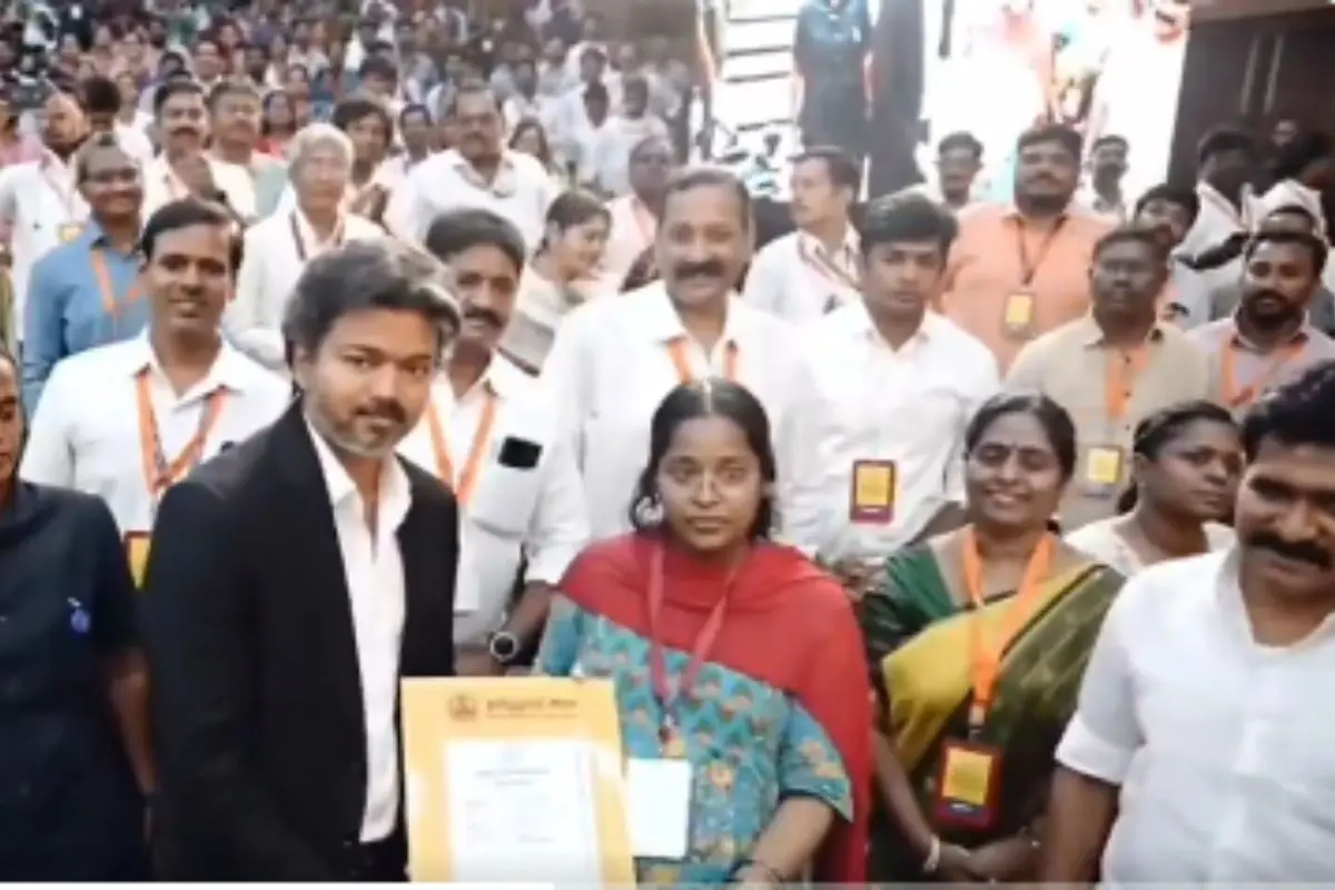 Vijay handing over appointment letter to the pregnant candidate after stepping down from the dais | Photo: X video screengrab