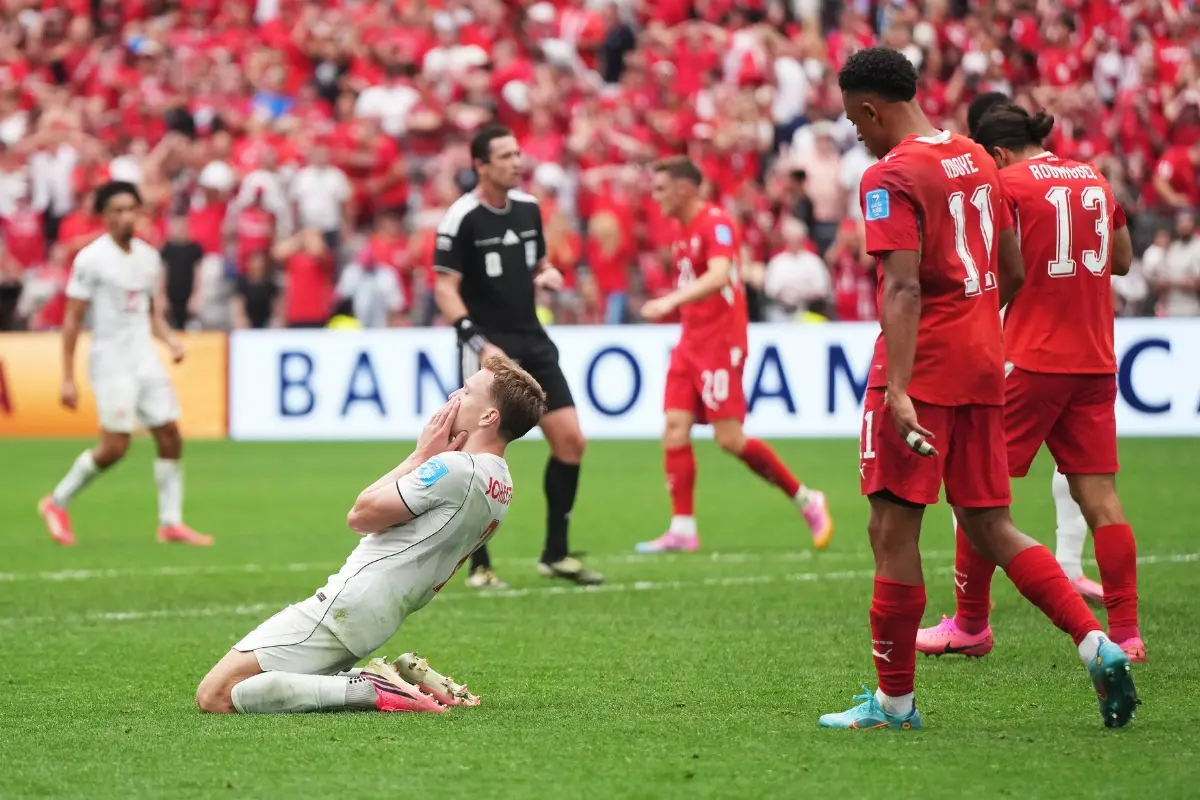 Canada's Alistair Johnston (2) reacts after a missed opportunity during the World Cup Group B football match between Switzerland and Canada | Photo: Darryl Dyck/The Canadian Press v