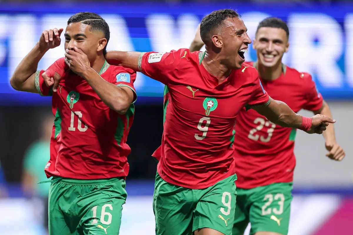 Gessime Yassine #16 of Morocco celebrates with teammate Soufiane Rahimi #9 of Morocco after scoring his team's fourth goal | Photo: Getty Images via AFP