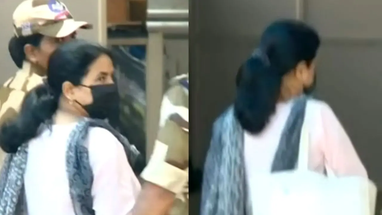 Veena in front of ED office