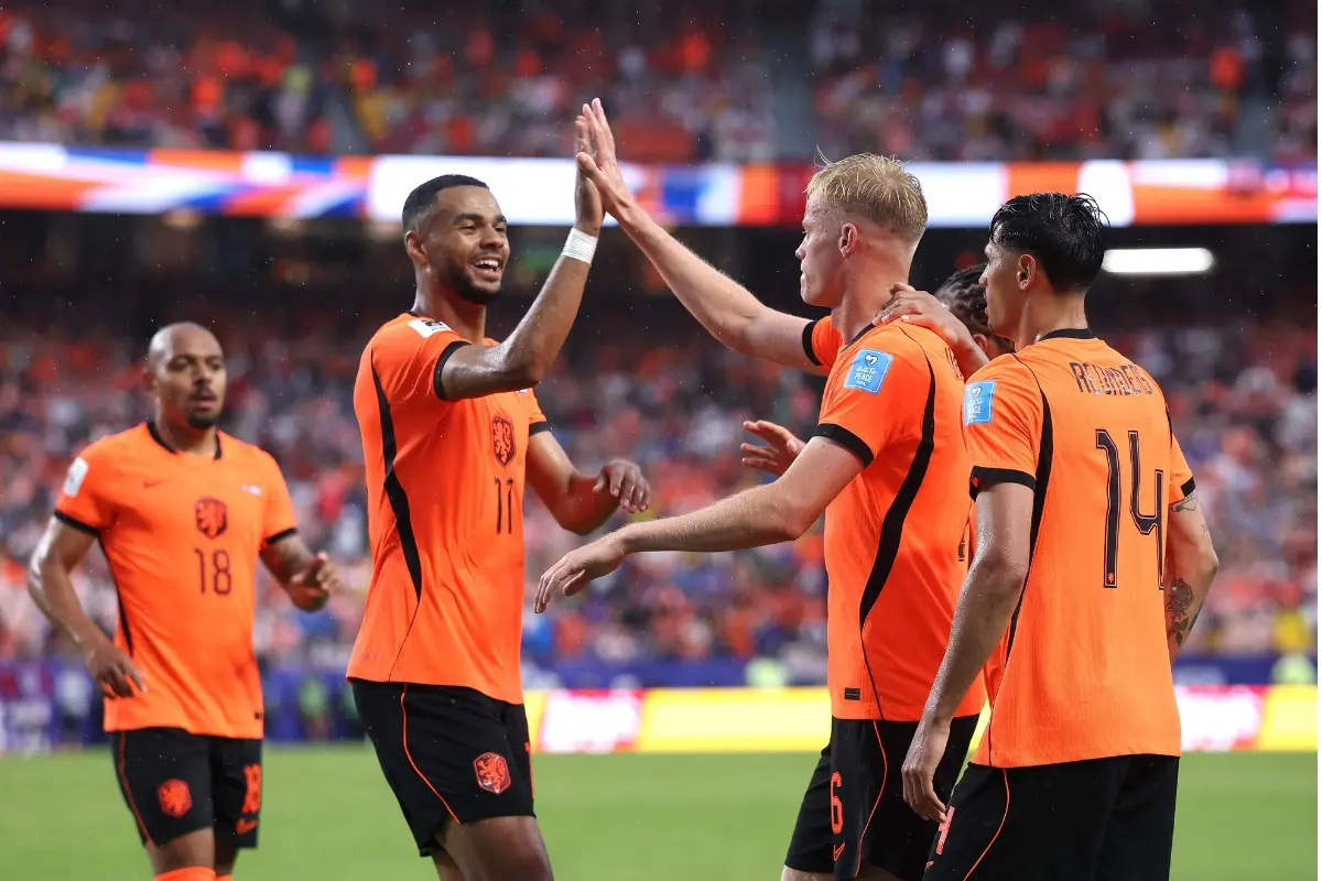Jan-Paul van Hecke #6 of Netherlands celebrates with teammates after scoring his team's third goal during the FIFA World Cup 2026 Group F match between Tunisia and Netherlands | Photo: Getty Images via AFP