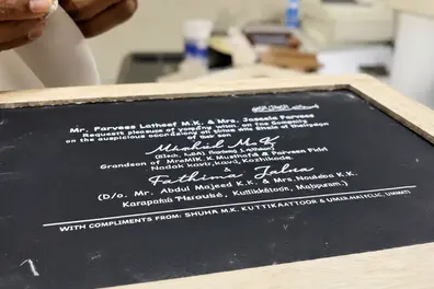 Guinness World Record holder from Kerala creates unique wooden slate wedding invitation