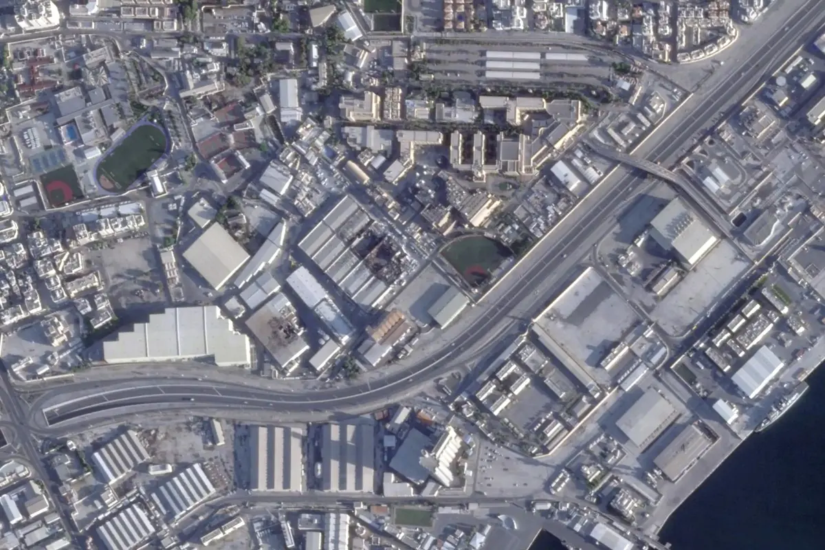 This satellite image from Planet Labs PBC shows damage after Iranian attacks on the U.S. Navy's 5th Fleet headquarters in Manama, Bahrain.| Photo: AP