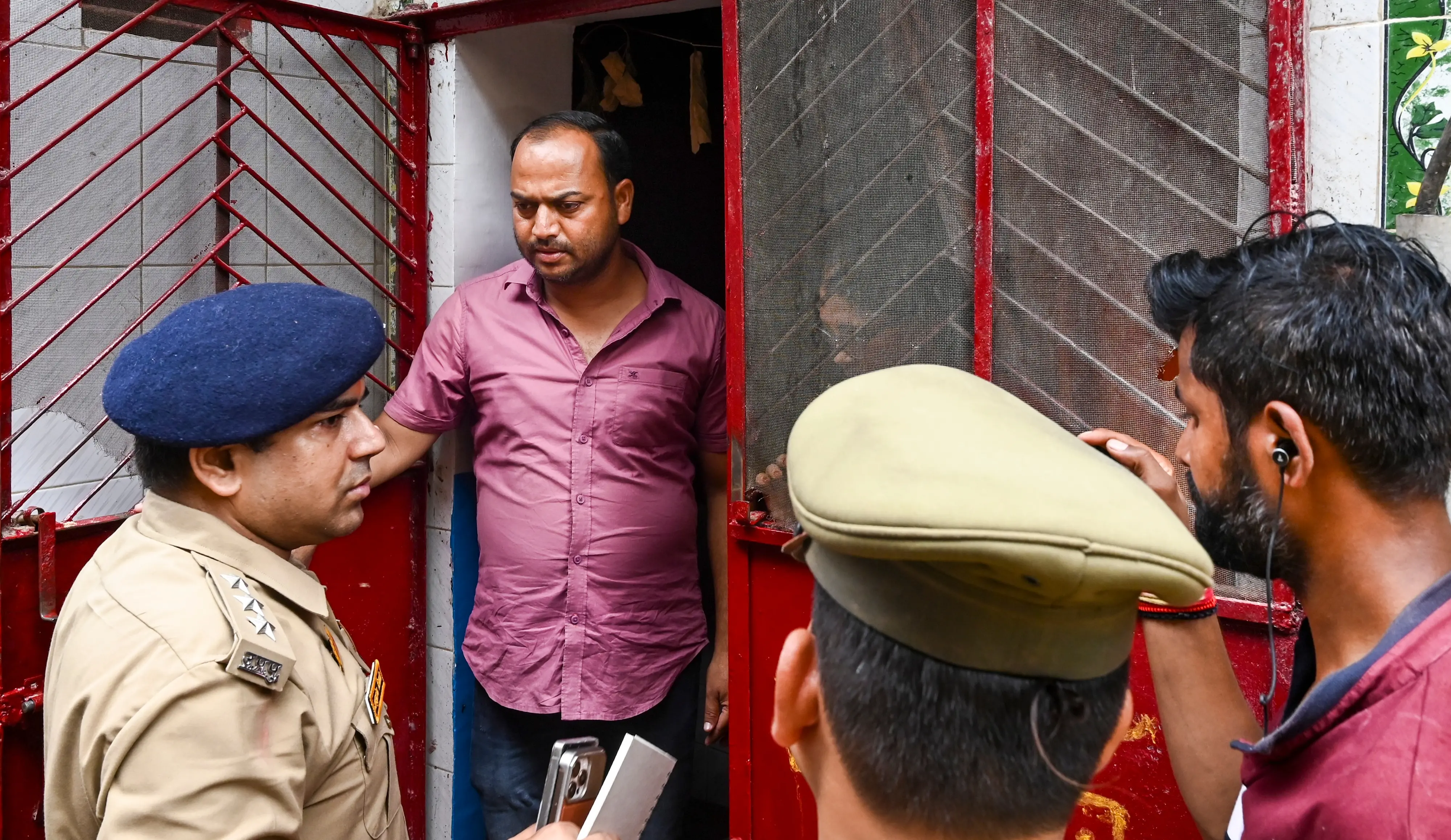 Police officials conduct a search operation at the residence of Ramashankar alias Tinnu Yadav, accused in connection with the embezzlement of donations at the Ram temple, in Ayodhya.| Photo: PTI