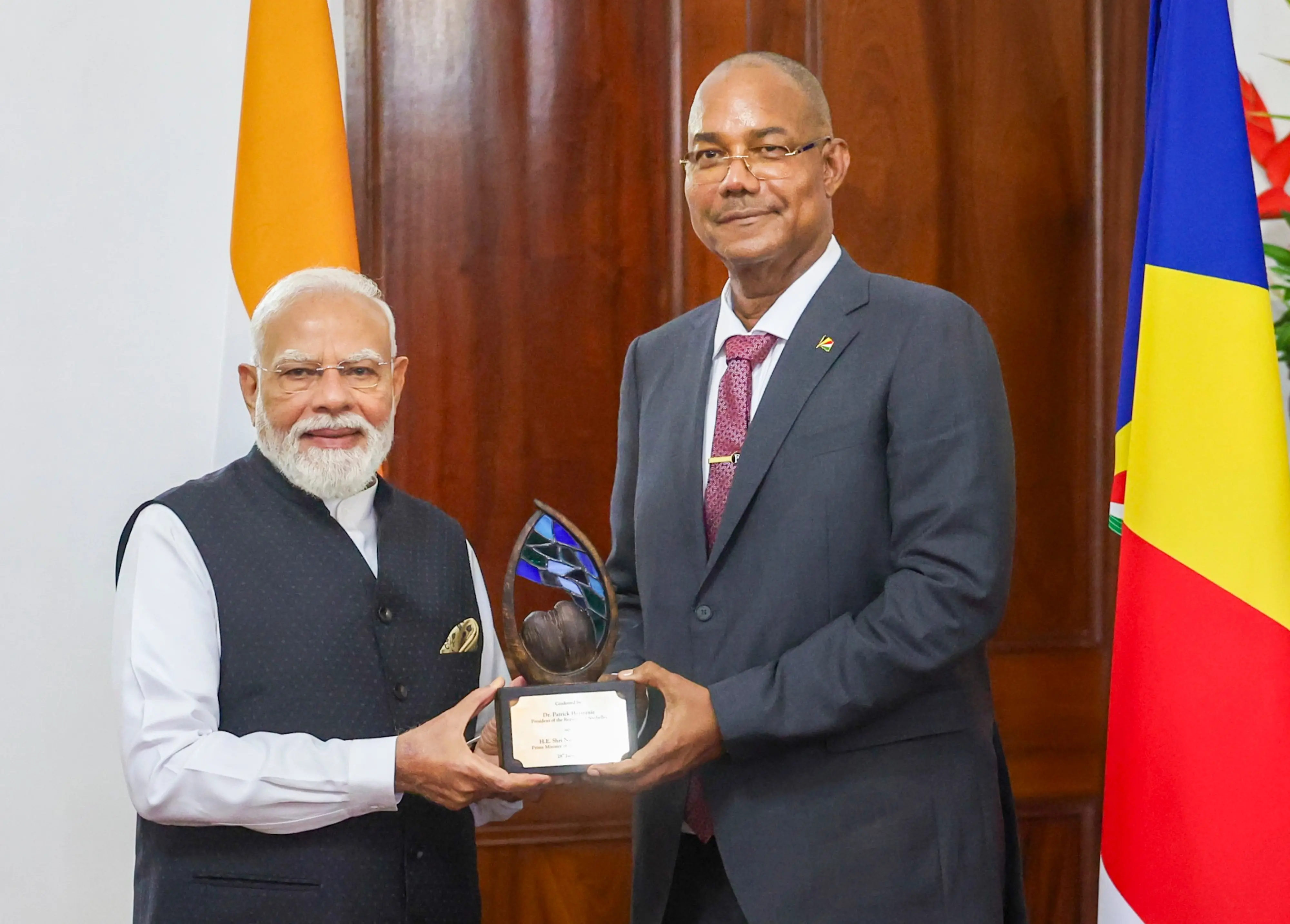 PM Modi receives 'Guardian of the Blue Horizon' from Seychelles President Herminie | PTI