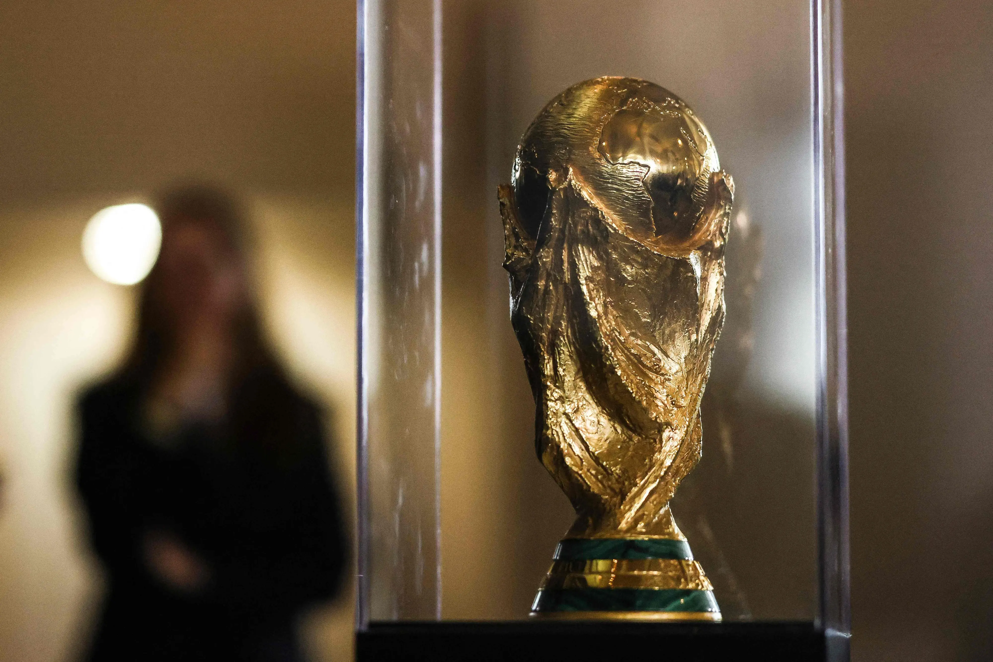 This view shows the original FIFA World Cup trophy, temporarily on display at the Freedom Tower in Miami | AFP