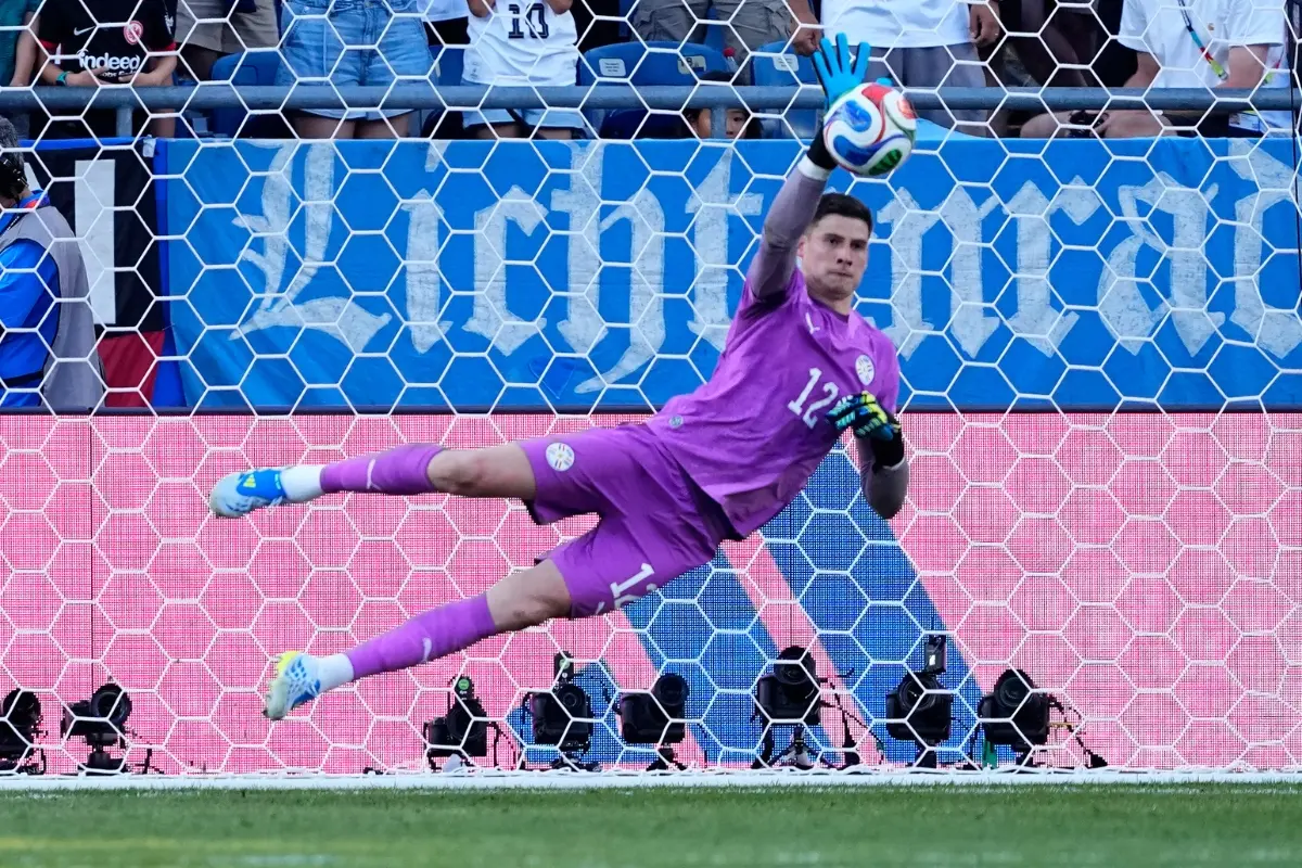 Paraguay goalkeeper Orlando Gill (12) makes a save during a penalty shootout at the end of during the World Cup round of 32 football match between Germany and Paraguay | Photo: AP