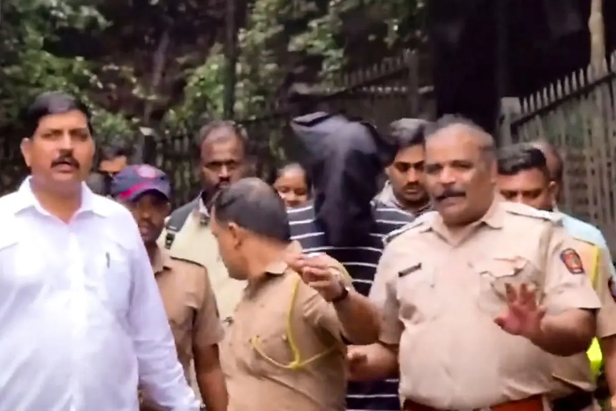 Chetan Chaudhary, an accused in the alleged murder of Pune realtor Ketan Agarwal, being brought back to police station after Pune police took him to Lohagad Fort for crime scene reconstruction, at Maval in Pune, Wednesday, July 1, 2026 (Photo: PTI)