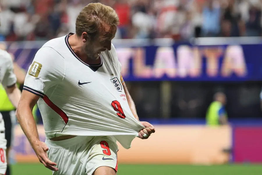 Harry Kane celebrates scoring his team's second goal during the 2026 World Cup round of 32 match