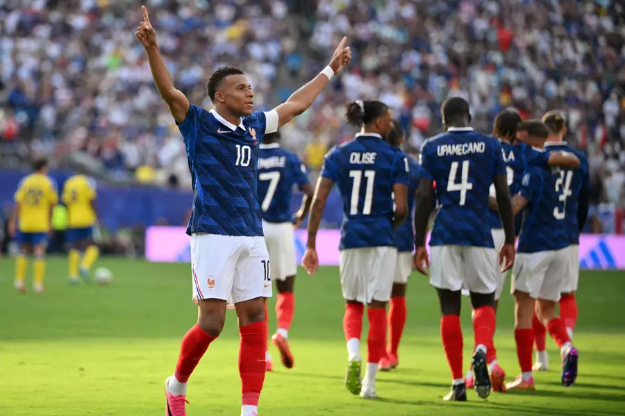 Kylian Mbappe celebrates scoring his team's third goal during the 2026 World Cup round of 32 football match between France and Sweden