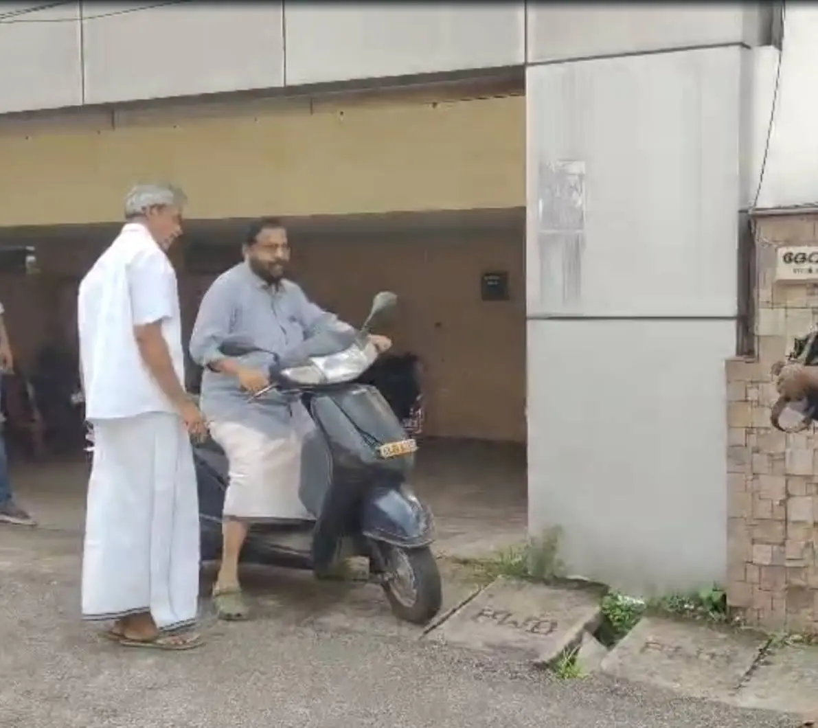 Kadakampally Surendran on scooter
