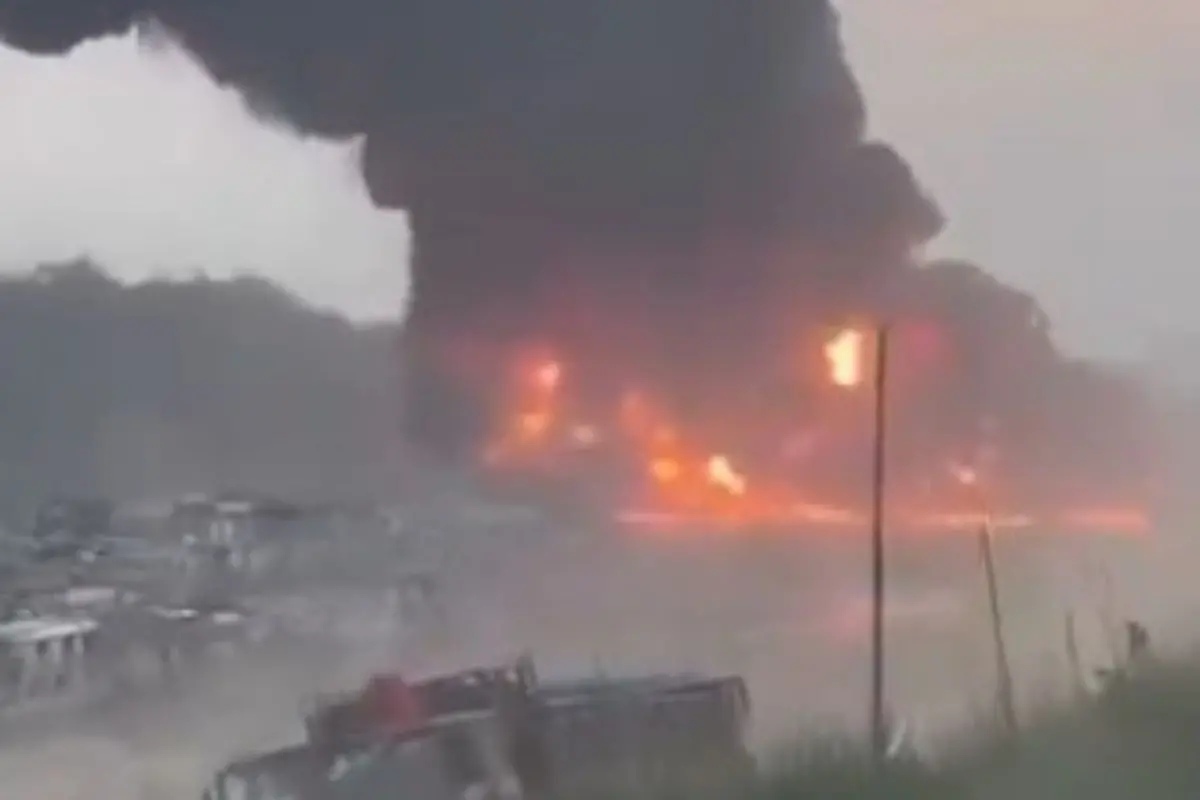 Thick black smoke and flames rise from an area in Myanmar's Rakhine State following reported military air strikes near the Bangladesh border, with explosions heard across Teknaf in Cox's Bazar after a seven-month lull.