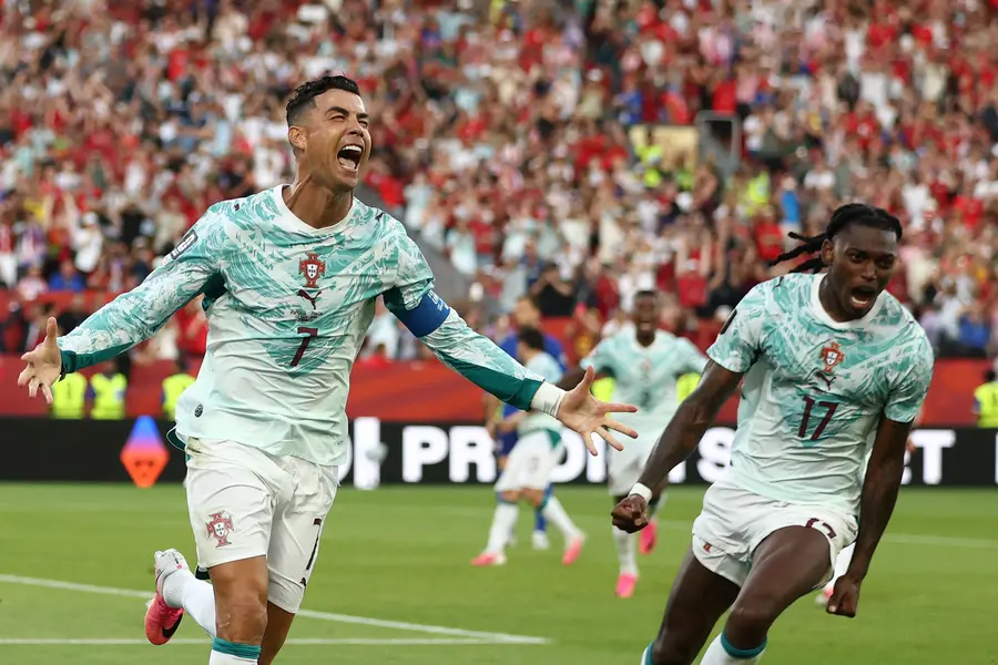 Cristiano Ronaldo celebrates after scoring his team's first goal