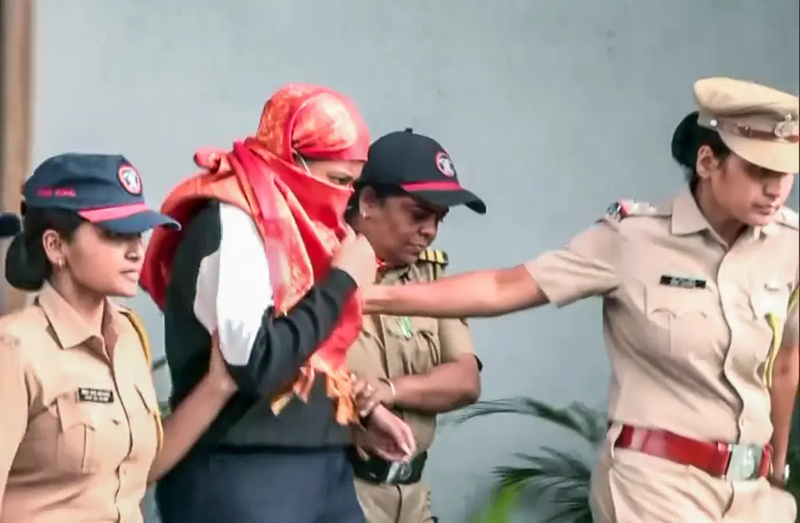 Accused Siya Goyal being taken to be produced before the court in relation to Ketan Agarwal murder case, in Lonavala. Photograph: ANI Video Grab