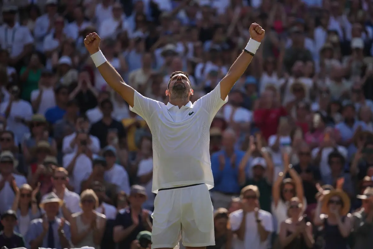 Novak Djokovic of Serbia celebrates his victory against Arthur Rinderknech of France in their third round men's singles match at the Wimbledon Tennis Championships | Photo: AP