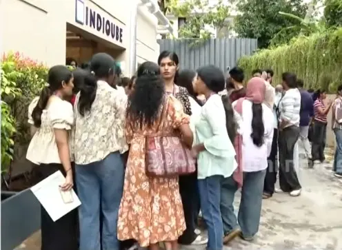 The CorroHealth employees outside their office | Photo: Screengrab/Mathrubhumi News